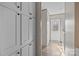 This mud room has storage cabinets and a view of the exterior through the glass door at 119 Old Hearth Rd, Clover, SC 29710