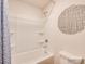Clean, bright bathroom with a shower-tub combination and modern fixtures at 12140 Devon Square Ct, Charlotte, NC 28262