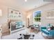 Cozy bedroom has delightful decor and receives plenty of natural light at 12140 Devon Square Ct, Charlotte, NC 28262