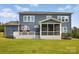 Spacious backyard featuring a deck, patio, and lush green lawn for outdoor enjoyment at 1276 Stonecrest Blvd, Tega Cay, SC 29708