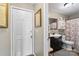 Cozy bathroom featuring a vanity, mirror, and shower with decorative curtain at 1411 Congress St, Gastonia, NC 28054