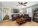 Cozy living room with comfortable seating, wood floors and natural light at 1411 Congress St, Gastonia, NC 28054