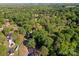 Aerial view of a neighborhood with homes, wooded areas and the surrounding landscape at 1500 Griffith Rd, Monroe, NC 28112