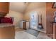 Functional laundry room includes washer, dryer, sink, storage cabinets, and convenient access to the outdoors at 1500 Griffith Rd, Monroe, NC 28112