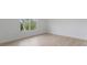 Bright bedroom featuring hardwood floors, white trim, and a double window at 15009 Lisha Ln, Charlotte, NC 28277
