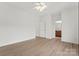 Large bedroom with hardwood floors and an ensuite bathroom at 15009 Lisha Ln, Charlotte, NC 28277