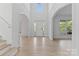 Inviting foyer with hardwood floors, high ceilings, and ample natural light at 15009 Lisha Ln, Charlotte, NC 28277