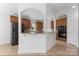 Kitchen with stainless steel appliances, granite countertops and dark wood cabinets with a breakfast bar at 15009 Lisha Ln, Charlotte, NC 28277