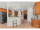 Kitchen with granite countertops, bar seating, stainless steel appliances and wood cabinets at 15009 Lisha Ln, Charlotte, NC 28277