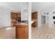 Open kitchen layout with granite countertops, stainless steel appliances, and dark wood cabinets at 15009 Lisha Ln, Charlotte, NC 28277
