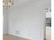 Bright and airy living room featuring wainscoting at 15009 Lisha Ln, Charlotte, NC 28277