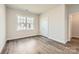 Cozy bedroom with neutral paint, bright window and closet at 1557 Croydon St, Indian Land, SC 29707