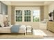 Bedroom featuring a large window for natural light, decorative pillows and neutral tones at 1557 Croydon St, Indian Land, SC 29707