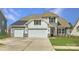 Charming home featuring a three car garage, stone accents, and attractive exterior finishes at 1557 Croydon St, Indian Land, SC 29707