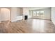 Bright living room with fireplace, modern flooring and large windows for ample natural light at 1557 Croydon St, Indian Land, SC 29707