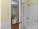 Bathroom with a shower and access to the stairs at 16421 Breckshire Dr, Huntersville, NC 28078