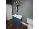 Updated bathroom features a vanity, framed mirror, and modern lighting at 1703 Polk St, Monroe, NC 28110