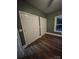 Bedroom featuring ample closet space and a window providing natural light, creating a cozy atmosphere at 1703 Polk St, Monroe, NC 28110