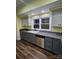 Well-lit kitchen with stainless steel dishwasher and modern fixtures, blending style and functionality seamlessly at 1703 Polk St, Monroe, NC 28110
