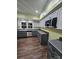 Modern kitchen with stainless steel appliances and sleek countertops, designed for both style and functionality at 1703 Polk St, Monroe, NC 28110