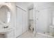 Bathroom featuring glass shower, subway tiles, and vanity sink at 1717 Thomas Ave, Charlotte, NC 28205