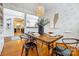 Dining room showcasing hardwood floors and modern table with decorative hanging light fixture at 1717 Thomas Ave, Charlotte, NC 28205