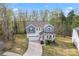 Charming two-story home with a manicured lawn and inviting front porch at 18518 Lahaina Ln, Charlotte, NC 28278