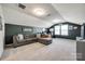 Spacious bonus room offering a large sectional sofa and a wall-mounted television at 1986 Thoreau Way, York, SC 29745