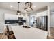Bright kitchen with a large island, stainless steel appliances, and stylish pendant lighting at 1986 Thoreau Way, York, SC 29745