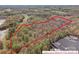 Aerial view of wooded property with approximate property lines overlaid in red at 2018 Fox Creek Trl, Lincolnton, NC 28092