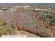 Aerial view of wooded property with approximate property lines overlaid in red at 2018 Fox Creek Trl, Lincolnton, NC 28092