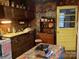 Quaint kitchen features unique decor, wood accents, and vintage appliances, adding to its rustic charm at 2018 Fox Creek Trl, Lincolnton, NC 28092