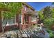Charming patio with stone flooring, brick accents, and cozy outdoor seating at 2021 Nolen Park Ln, Charlotte, NC 28209