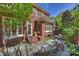 Private outdoor patio with stone pavers, brick accents, and a cozy seating area, perfect for enjoying the outdoors at 2021 Nolen Park Ln, Charlotte, NC 28209