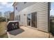 Backyard patio with grill, with view of the home's siding and windows at 2105 Moss Bluff Dr, Mint Hill, NC 28227