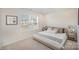 Cozy bedroom with a window, neutral decor and bedside tables at 2105 Moss Bluff Dr, Mint Hill, NC 28227