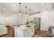 Stylish kitchen showcasing an island with seating, stainless steel appliances, and modern finishes at 2105 Moss Bluff Dr, Mint Hill, NC 28227