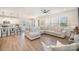 Spacious living area with an open floor plan and modern ceiling fan at 2105 Moss Bluff Dr, Mint Hill, NC 28227