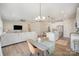 Open concept living space with a dining area and a view of the kitchen at 2105 Moss Bluff Dr, Mint Hill, NC 28227