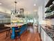 Gourmet kitchen with a large center island, high-end appliances, and ample storage space at 2132 Rolston Dr, Charlotte, NC 28207