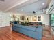 Bright, airy living space with hardwood floors, comfortable seating, and access to the kitchen at 2132 Rolston Dr, Charlotte, NC 28207