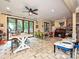 Spacious studio with natural light, ideal for arts and crafts with tile floors and a fan at 2132 Rolston Dr, Charlotte, NC 28207