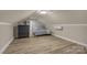 Cozy bedroom with sloped ceilings, hardwood floors, and a comfortable bed at 22 Honeysuckle Ln, Clover, SC 29710