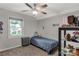 Inviting bedroom with neutral walls, ceiling fan, plush carpet, and natural light at 22 Honeysuckle Ln, Clover, SC 29710