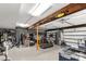 Spacious garage with epoxy floors, overhead lighting, and ample storage space, complete with workout equipment at 22 Honeysuckle Ln, Clover, SC 29710