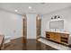 Spacious bathroom features a large double shower, stained concrete floors, and a modern vanity with an elegant mirror at 221 Colony Dr, Mooresville, NC 28115
