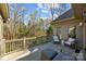 Outdoor deck with seating and peaceful wooded view at 221 Colony Dr, Mooresville, NC 28115