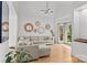 Bright living room with vaulted ceilings, large windows, and stylish furniture at 221 Colony Dr, Mooresville, NC 28115