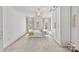 Airy main bedroom with statement lighting, a four poster bed and neutral wallpaper at 221 Colony Dr, Mooresville, NC 28115