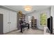 Cozy room perfect for an office with a bookcase, large windows, and neutral colors at 221 Colony Dr, Mooresville, NC 28115